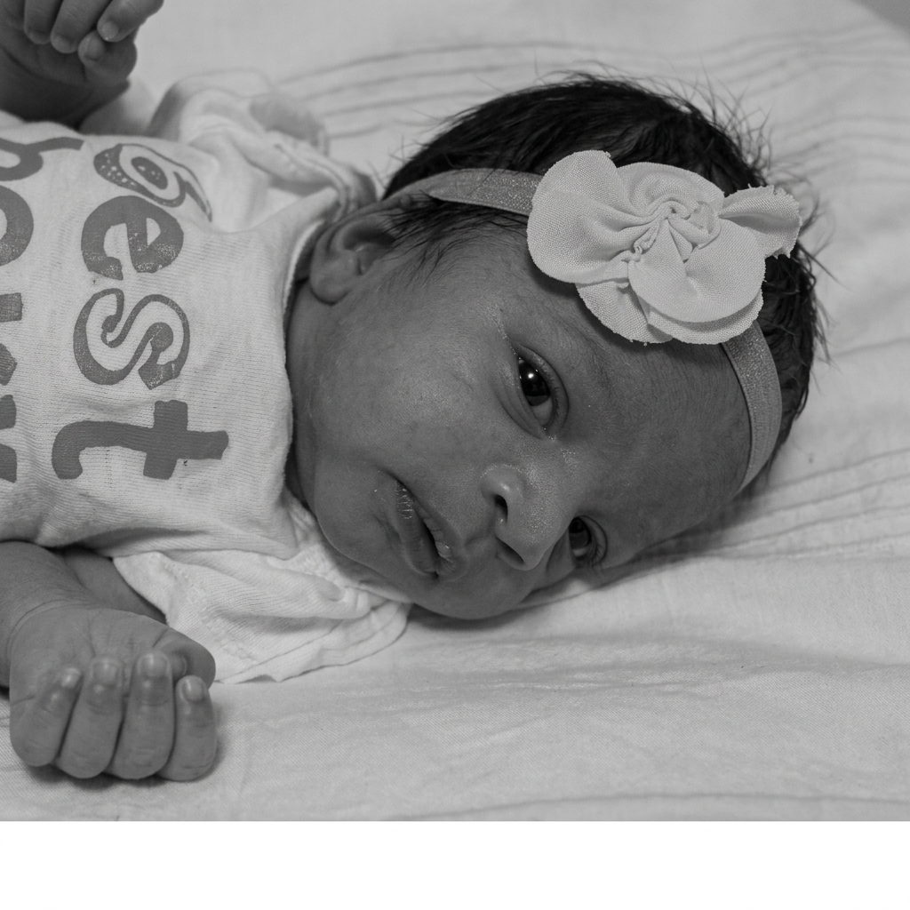 Newborn with floral headband